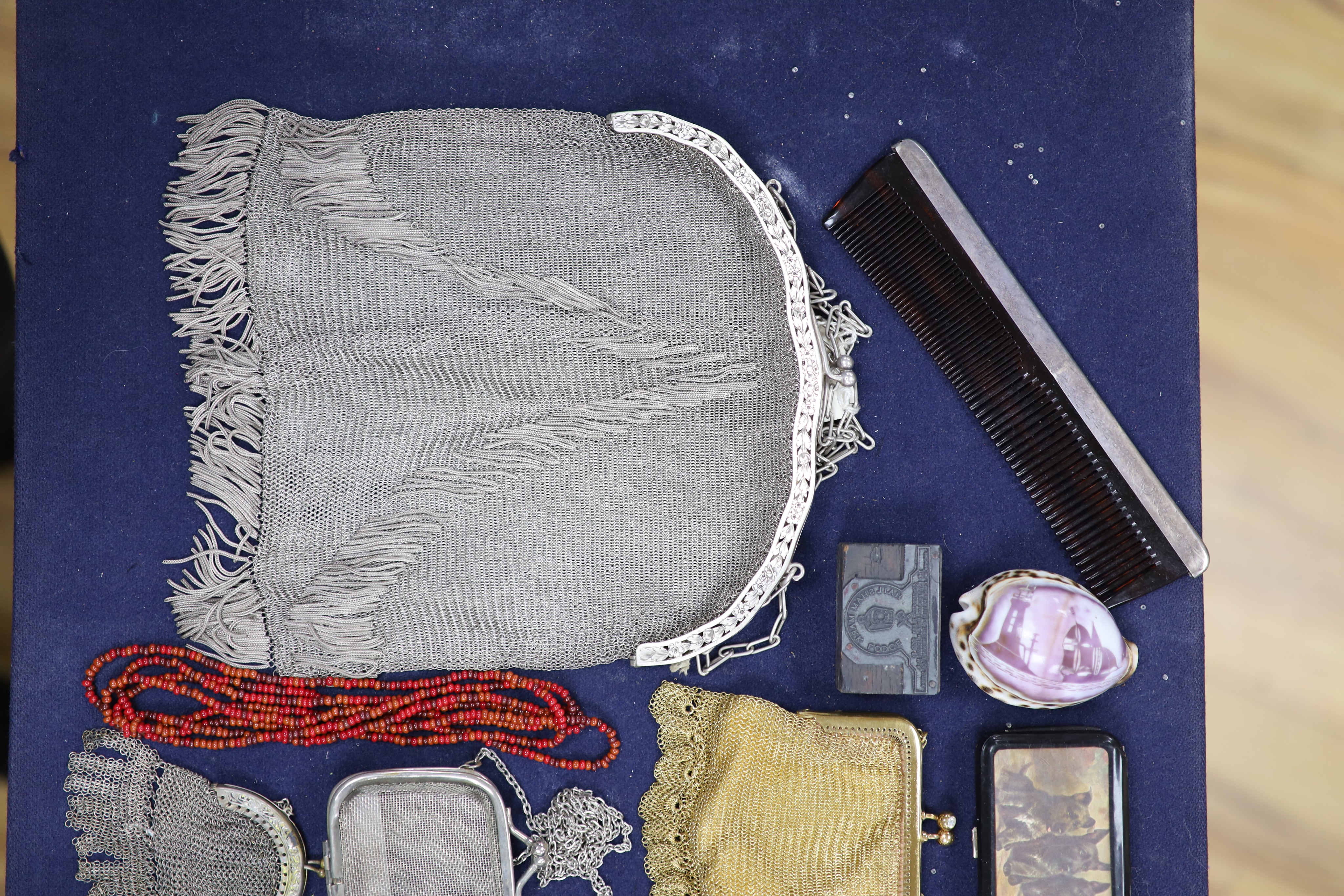 A collection of approximately fifty Victorian and later beadwork, white metal and fabric purses etc.